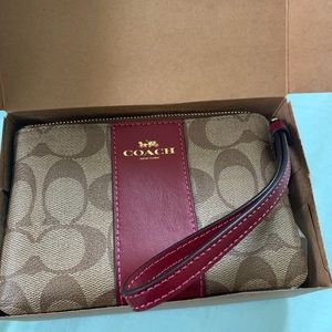 Signature Coach wristlet